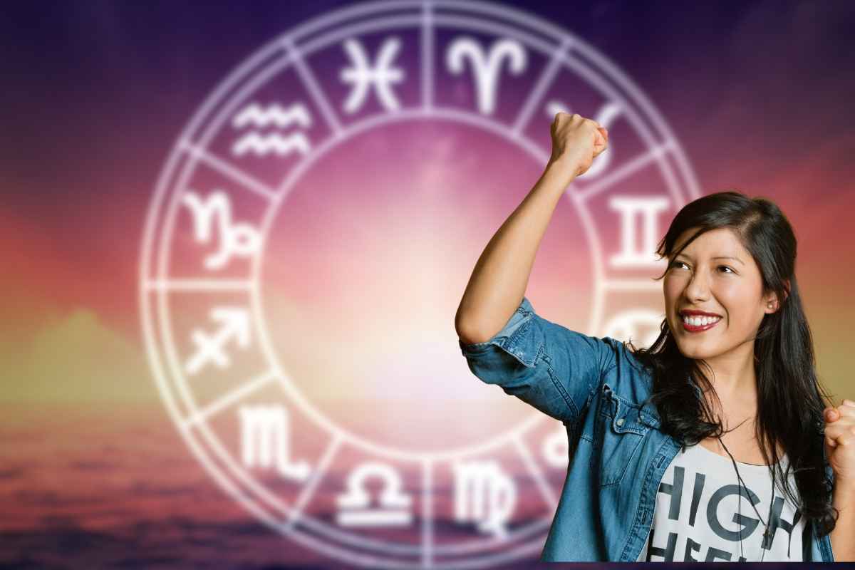 donna che esulta con dietro segni zodiacali